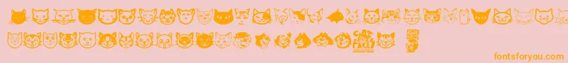 フォントCat Faces – オレンジの文字がピンクの背景にあります。