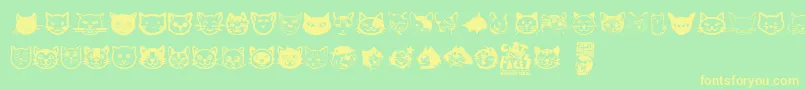 Cat Faces Font – Yellow Fonts on Green Background