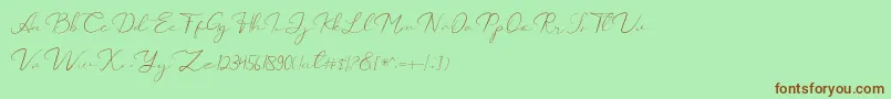 フォントCatalan Signature – 緑の背景に茶色のフォント