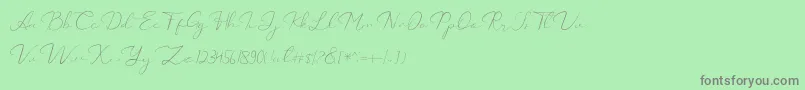 フォントCatalan Signature – 緑の背景に灰色の文字