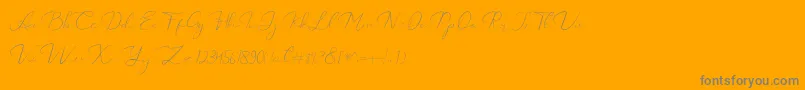 Catalan Signature-fontti – harmaat kirjasimet oranssilla taustalla