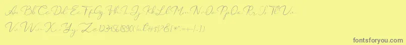 Weitere Informationen zur Catalan Signature-Schriftart Catalan Signature-Schriftart – Graue Schriften auf gelbem Hintergrund