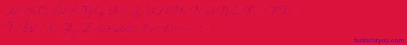 フォントCatalan Signature – 赤い背景に紫のフォント