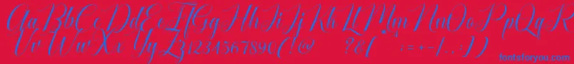 Cataline Script-Schriftart – Blaue Schriften auf rotem Hintergrund