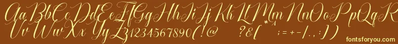 Cataline Script-Schriftart – Gelbe Schriften auf braunem Hintergrund