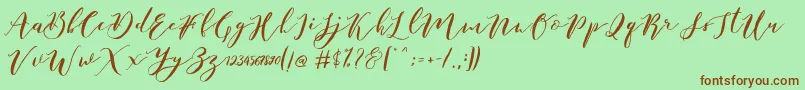 Catandra Brush Script-fontti – ruskeat fontit vihreällä taustalla