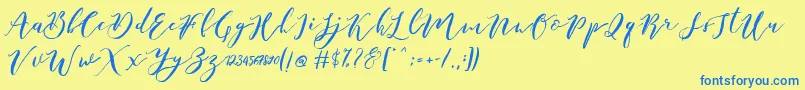 フォントCatandra Brush Script – 青い文字が黄色の背景にあります。