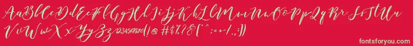 Czcionka Catandra Brush Script – zielone czcionki na czerwonym tle