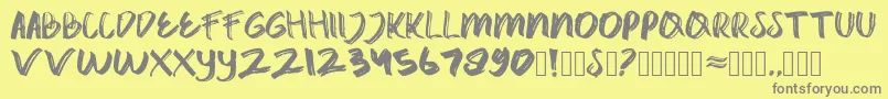 フォントcatrock – 黄色の背景に灰色の文字