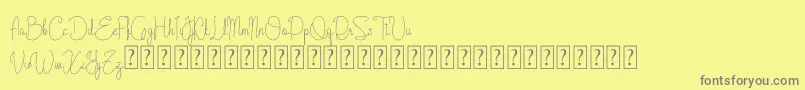 Fonte Cattalleya Demo – fontes cinzas em um fundo amarelo