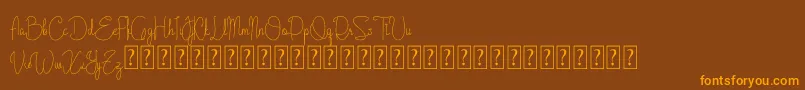Cattalleya Demo Font – Orange Fonts on Brown Background