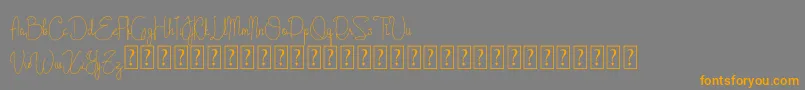 Cattalleya Demo-Schriftart – Orangefarbene Schriften auf grauem Hintergrund