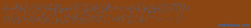 フォントCattclay – 茶色の背景に青い文字