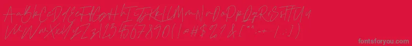 フォントCattclay – 赤い背景に灰色の文字