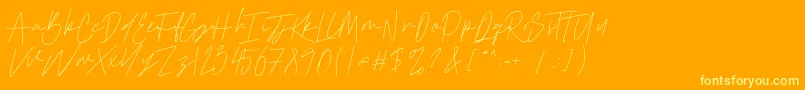 Cattclay-Schriftart – Gelbe Schriften auf orangefarbenem Hintergrund