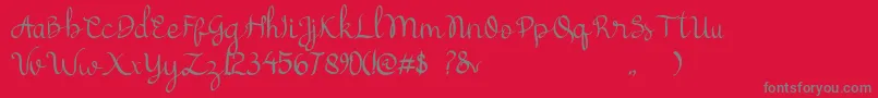 フォントcattelyna – 赤い背景に灰色の文字