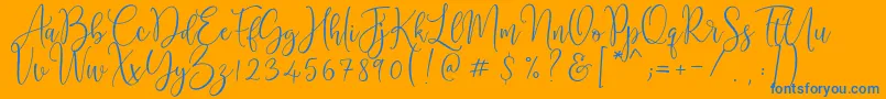 Cattieshine-Schriftart – Blaue Schriften auf orangefarbenem Hintergrund