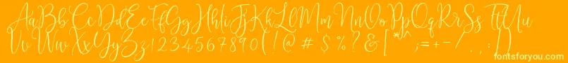 Cattieshine-Schriftart – Gelbe Schriften auf orangefarbenem Hintergrund