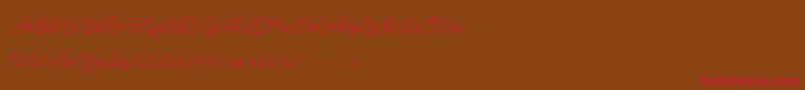 Cattomscute Font – Red Fonts on Brown Background
