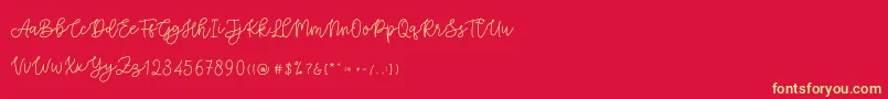 Cattomscute Font – Yellow Fonts on Red Background