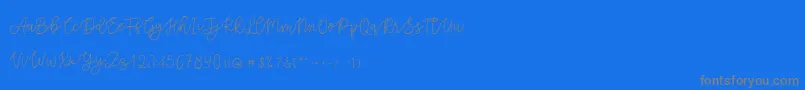 Cattomscute-Schriftart – Graue Schriften auf blauem Hintergrund