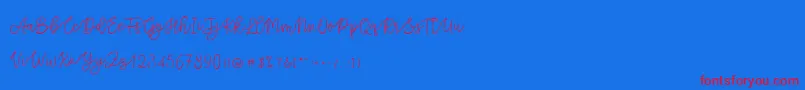 Cattomscute Font – Red Fonts on Blue Background