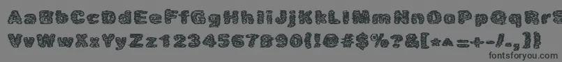 フォントCaustic – 黒い文字の灰色の背景