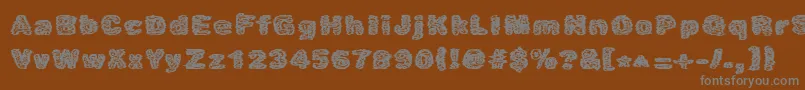 Caustic Font – Gray Fonts on Brown Background