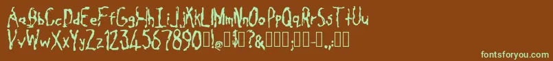 フォントCavity Regular – 緑色の文字が茶色の背景にあります。