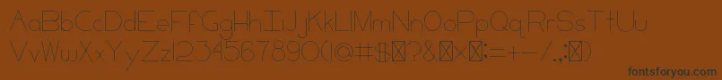 CCKeni Font – Black Fonts on Brown Background