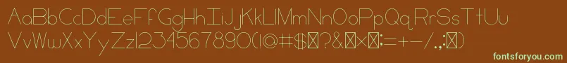 フォントCCKeni – 緑色の文字が茶色の背景にあります。