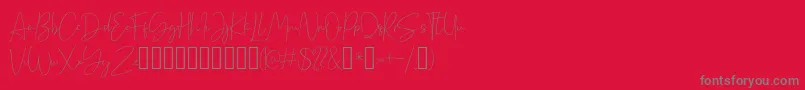Cellina-Schriftart – Graue Schriften auf rotem Hintergrund