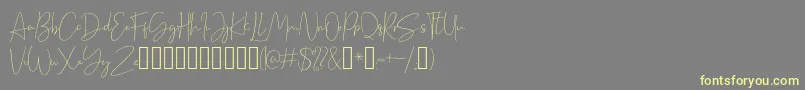 Cellina Font – Yellow Fonts on Gray Background