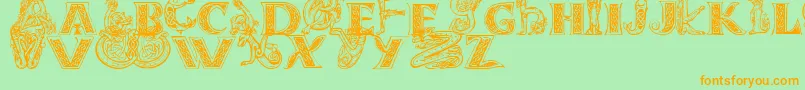 Celtasmigoria-Schriftart – Orangefarbene Schriften auf grünem Hintergrund