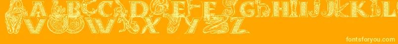 Celtasmigoria-Schriftart – Gelbe Schriften auf orangefarbenem Hintergrund
