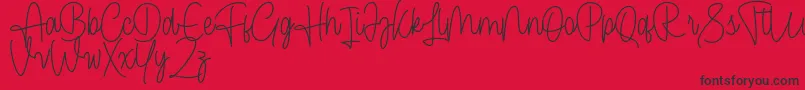 フォントCendolita Script Free – 赤い背景に黒い文字