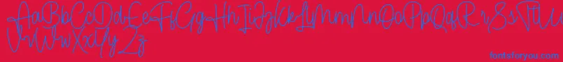 Cendolita Script Free Font – Blue Fonts on Red Background