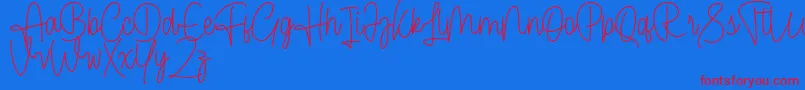 フォントCendolita Script Free – 赤い文字の青い背景