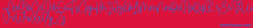 Cendolita Script Free-Schriftart – Blaue Schriften auf rotem Hintergrund