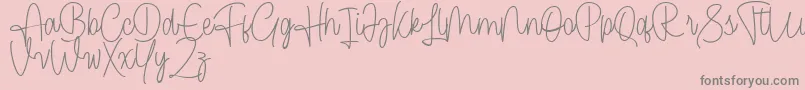 Cendolita Script Free Font – Gray Fonts on Pink Background