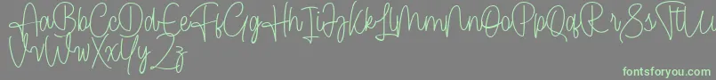 Cendolita Script Free Font – Green Fonts on Gray Background