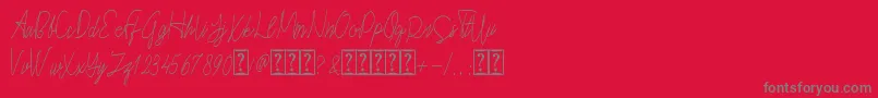 Cepttoni Font – Gray Fonts on Red Background