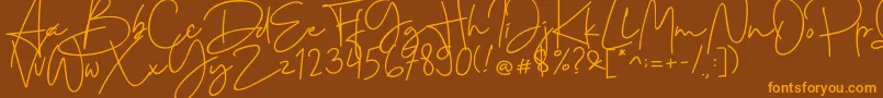 Cervanttis-Schriftart – Orangefarbene Schriften auf braunem Hintergrund