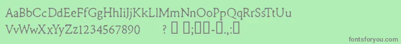 CFRemingtonTypewriter Regul-fontti – harmaat kirjasimet vihreällä taustalla