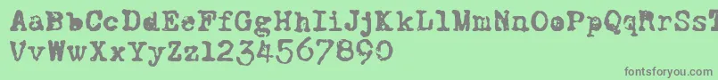 CFWorldatWarPERSO Regular Font – Gray Fonts on Green Background