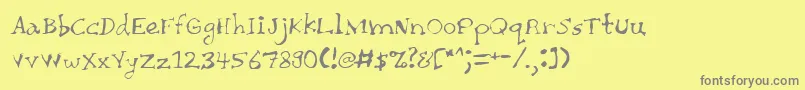 フォントCHAIT    – 黄色の背景に灰色の文字