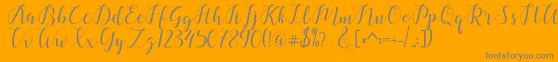 chalala-Schriftart – Graue Schriften auf orangefarbenem Hintergrund