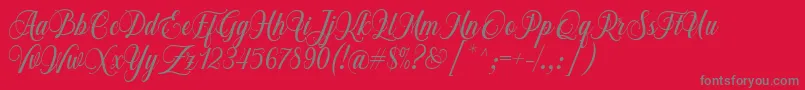 Fonte Chalisa Octavia Font D by 7NTypes – fontes cinzas em um fundo vermelho