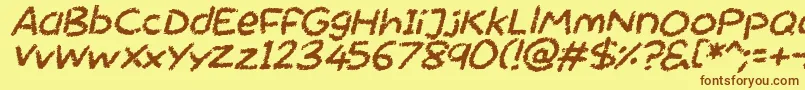 Fonte Chalktastic Italic – fontes marrons em um fundo amarelo