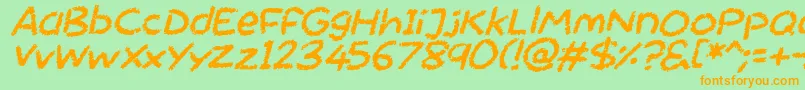 Chalktastic Italic-Schriftart – Orangefarbene Schriften auf grünem Hintergrund